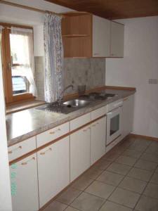 Kuchyň nebo kuchyňský kout v ubytování Ferienwohnung Regauer