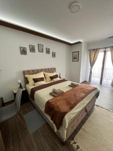 Postel nebo postele na pokoji v ubytování Apartman S2
