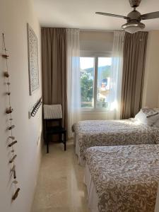 Letto o letti in una camera di Manilva Playa 15C