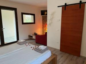 Postel nebo postele na pokoji v ubytování Marimastè