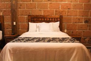 Letto o letti in una camera di Hotel Real Nirvana