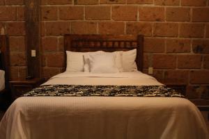 Letto o letti in una camera di Hotel Real Nirvana