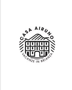 ein Logo für einen Antiquitätenaustausch in Bangalore in der Unterkunft casa airuno in Airuno