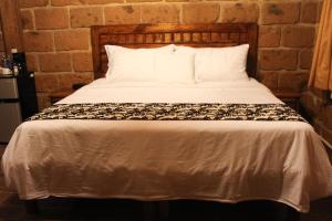Letto o letti in una camera di Hotel Real Nirvana