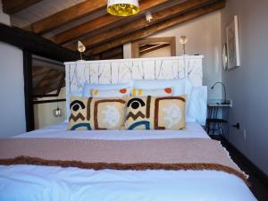 Ένα ή περισσότερα κρεβάτια σε δωμάτιο στο El PENTHOUSE de La Casa Rebonita