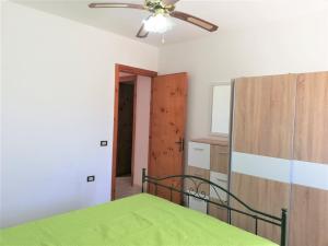 Postel nebo postele na pokoji v ubytování 054 e 055 Spiaggia direttamente sulla spiaggia di SalentoInVacanza.Com