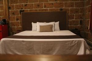 Letto o letti in una camera di Hotel Real Nirvana