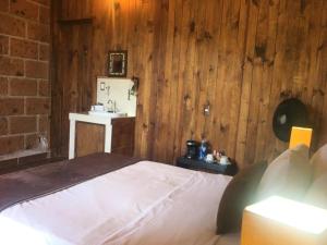 Letto o letti in una camera di Hotel Real Nirvana