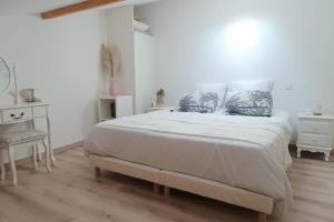 Posteľ alebo postele v izbe v ubytovaní Loft en centre ville