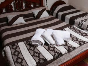 Postel nebo postele na pokoji v ubytování La Casa del Tata
