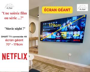 Televízia a/alebo spoločenská miestnosť v ubytovaní Le 9 de Cœur - 2 chambres - 6 couchages
