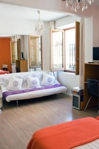 Postel nebo postele na pokoji v ubytování Gran Hostal San Segundo