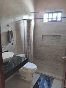 Koupelna v ubytování Casa Flamingo Telchac + 7 fotografií