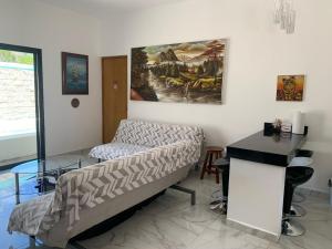 Postel nebo postele na pokoji v ubytování Casa Flamingo Telchac