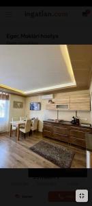 Kuchyňa alebo kuchynka v ubytovaní Paradise Apartmanház