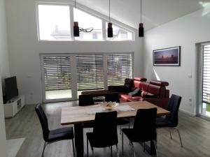 a living room with a table and a couch at Morning Coffee in Ljubljana