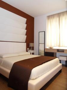 Postel nebo postele na pokoji v ubytování Conchiglia Suite