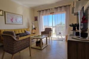 Posezení v ubytování Cosy holiday flat in Oasis Parque