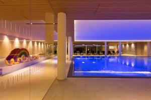 Bazén v ubytování Almhotel Hochhäderich nebo v jeho okolí