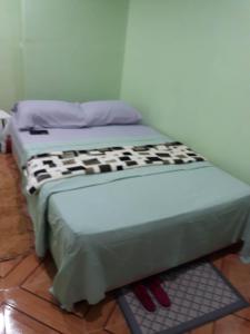 Postel nebo postele na pokoji v ubytování Susing Seaside Guesthouse