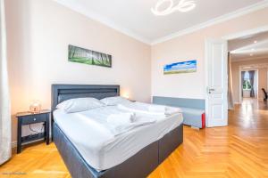 Posteľ alebo postele v izbe v ubytovaní Imperial Apartments Schönbrunn - Contactless Check-In