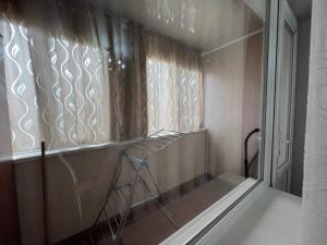 Ένα μπάνιο στο apartment on st. Ibraimova 42 +8 φωτογραφίες