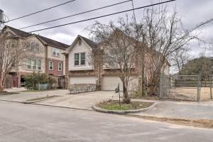 a house on the corner of a street at River Oaks 4BD Home Walkable to Whole Foods & Eateries in Houston