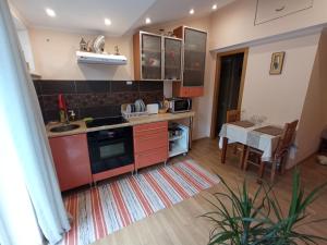 A kitchen or kitchenette at Jurmala's Centre Apartments