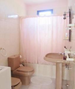 a bathroom with a toilet and a sink and a shower at House Rural,Biosphere Reserve World.Taganana.Tfe. in Santa Cruz de Tenerife