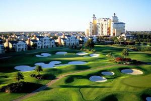 a view of a golf course at a resort at Reunion Resort pool home with hot tub / 4 bedrooms in Kissimmee