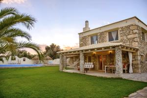 Casa de piedra con patio en villa Armonia -Pitsidia, Matala, Kalamaki, en Pitsidia