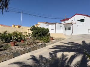 a street with a white house and some plants at Salobre Blue Sky 2 in Salobre