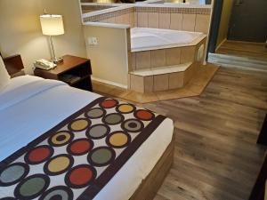 Letto o letti in una camera di Super 8 by Wyndham Duncan