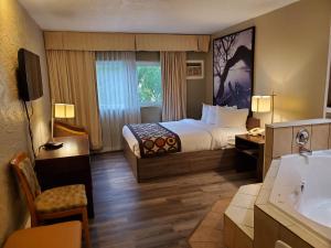Letto o letti in una camera di Super 8 by Wyndham Duncan