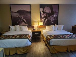 Letto o letti in una camera di Super 8 by Wyndham Duncan