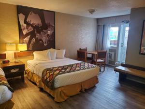 Letto o letti in una camera di Super 8 by Wyndham Duncan