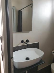 A bathroom at Tiny studio 2 min walking distance from the port Még 2 kép