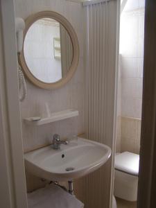 Um banheiro em Hotel Fiammetta