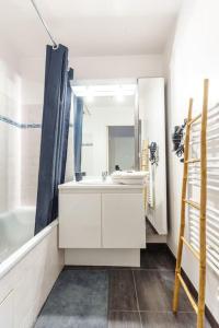 Kúpeľňa v ubytovaní Appartement confortable proche Disneyland Paris
