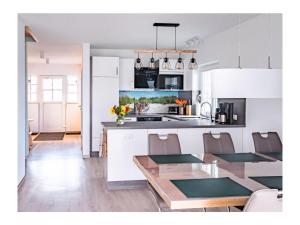Kuchyň nebo kuchyňský kout v ubytování Ferienhaus Familienkoje Rike