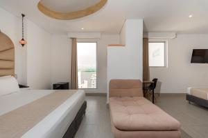 Postel nebo postele na pokoji v ubytování Hotel Cartagena Dubai