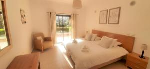 En eller flere senge i et værelse på Apartamento Buganvilia