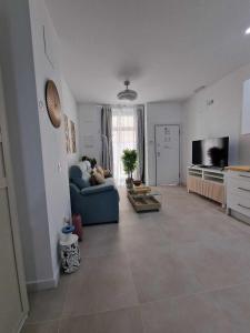 Televízia a/alebo spoločenská miestnosť v ubytovaní Moderno apartamento 2 junto a Calle Mármoles