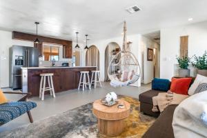 a living room with a couch and a table at The Castle House Estate in Joshua Tree