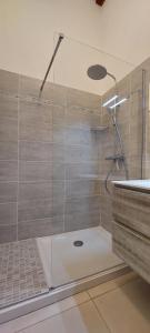 a shower with a glass door in a bathroom at Le Duplex 4 Pers - 10 min des plages in Sainte-Croix-de-Verdon +39 photos