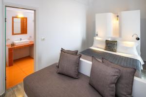 Postel nebo postele na pokoji v ubytování Alizea Villas & Suites
