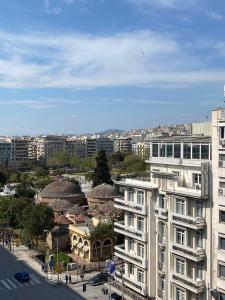 a view of a city with a building at Gnaios penthouse in Thessaloniki