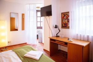 Postel nebo postele na pokoji v ubytování Hotel Sofra