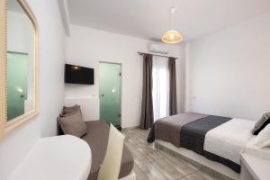 Postel nebo postele na pokoji v ubytování Alizea Villas & Suites