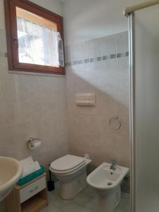 Koupelna v ubytování Casa Simonetta + 6 fotografií